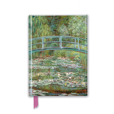 Fin Anteckningsbok med konsteverk av Claude Monet på pärmen.