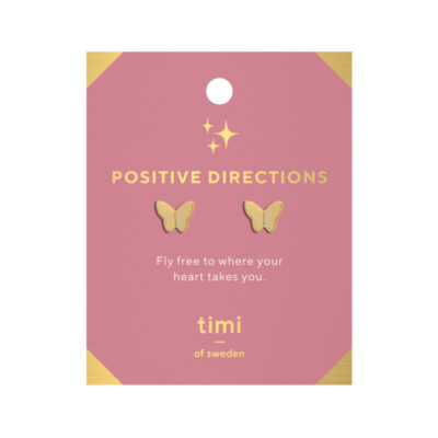 Örhängen med söta fjärilar på ett rosa kort med citat.
