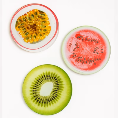 Coasters I glas, passionsfrukt, vattenmelon och kiwi.