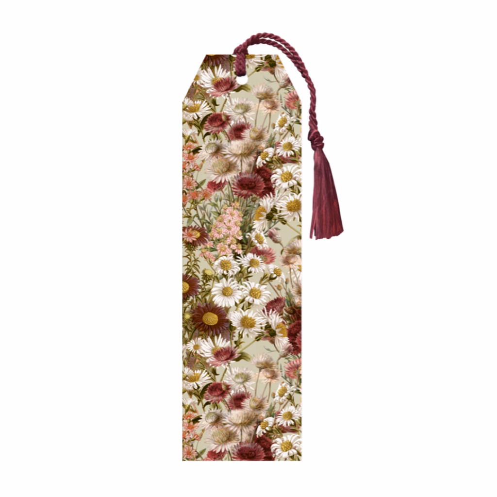 Bokmärke med lila blommor och matchande tofs.