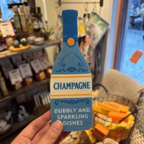 Disksvamp i form av en champagneflaska.